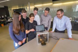 Students from various disciplines at the Baden-Württemberg Cooperative State University developing the Trumpf Cube. Left to right: Livia Greisiger, Kai-Uwe Hüber, Daniela Schindler, Julian Gergen, Daniel Stannard (Digital Instructor) and Torsten Klaus (Head of Technical Apprenticeship) with their Digital Key Box. Photo: Trumpf/ Weise