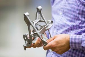 GM joined forces with Autodesk to develop the first 3D-printed and functionally optimised seat holder. Photo: GM